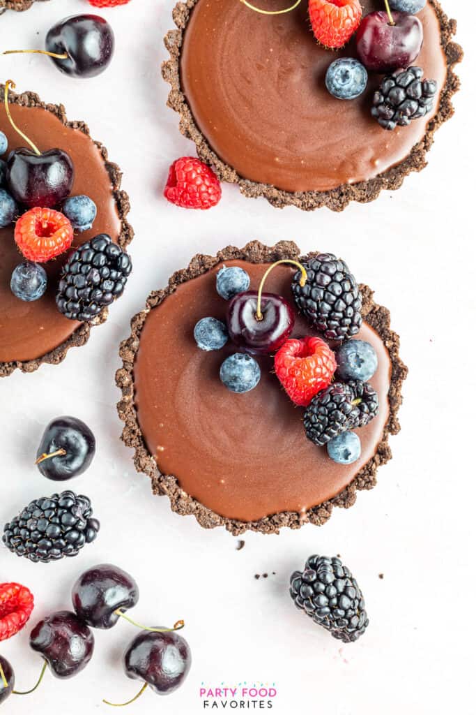 oreo chocolate tarts topped with fresh berries