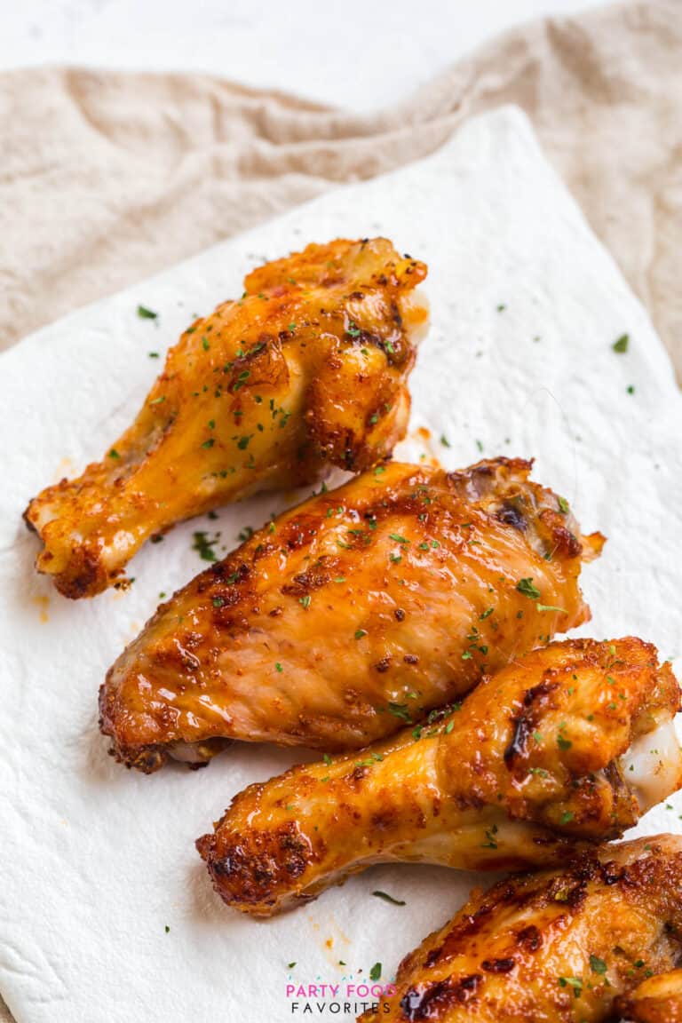 honey hot wings recipe topped with parsley