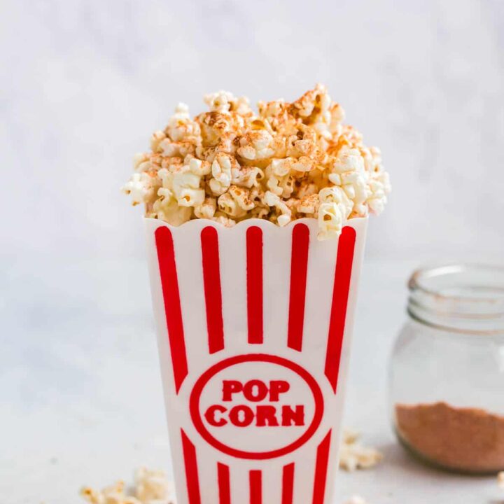 buffalo chicken popcorn seasoning on top of fresh popcorn