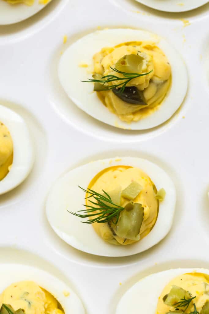 deviled eggs with pickles and dill