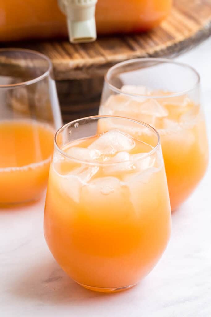 easy party punch recipe with orange juice and cherries