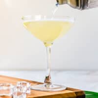 easy key lime daiquiri being poured into a chilled glass