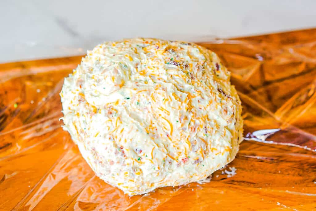 cheeseball on plastic wrap