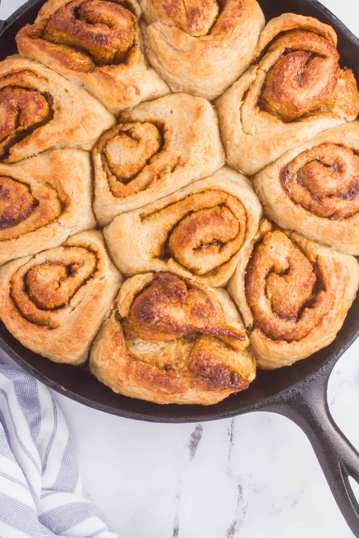 cinnamon rolls baked in a cast iron pan